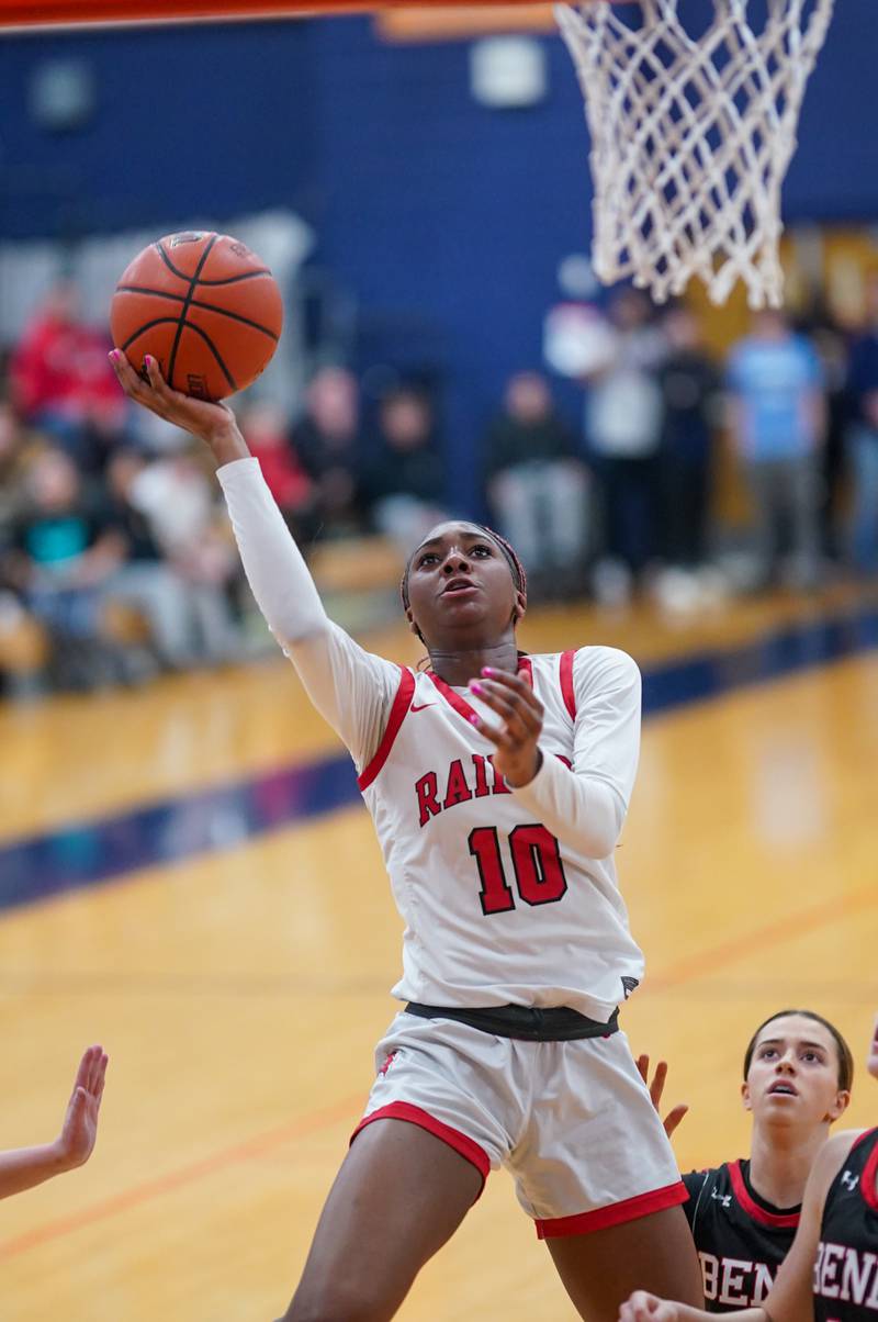 Bolingbrook's Trinity Jones (10) shoots the ball in the post against Benet during a Oswego semifinal sectional 4A basketball game at Oswego High School on Tuesday, Feb 20, 2024.