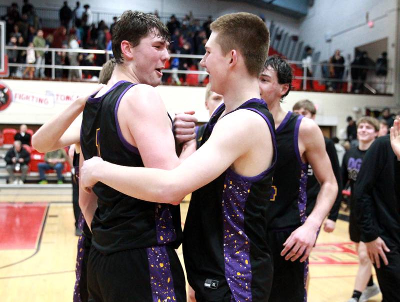 Downers Grove North’s Jake Riemer (left) and Bobby Grganto (right) celebrate their win over Bolingbrook in the Class 4A East Aurora Boys Basketball Sectional final on Friday, March 1, 2024.