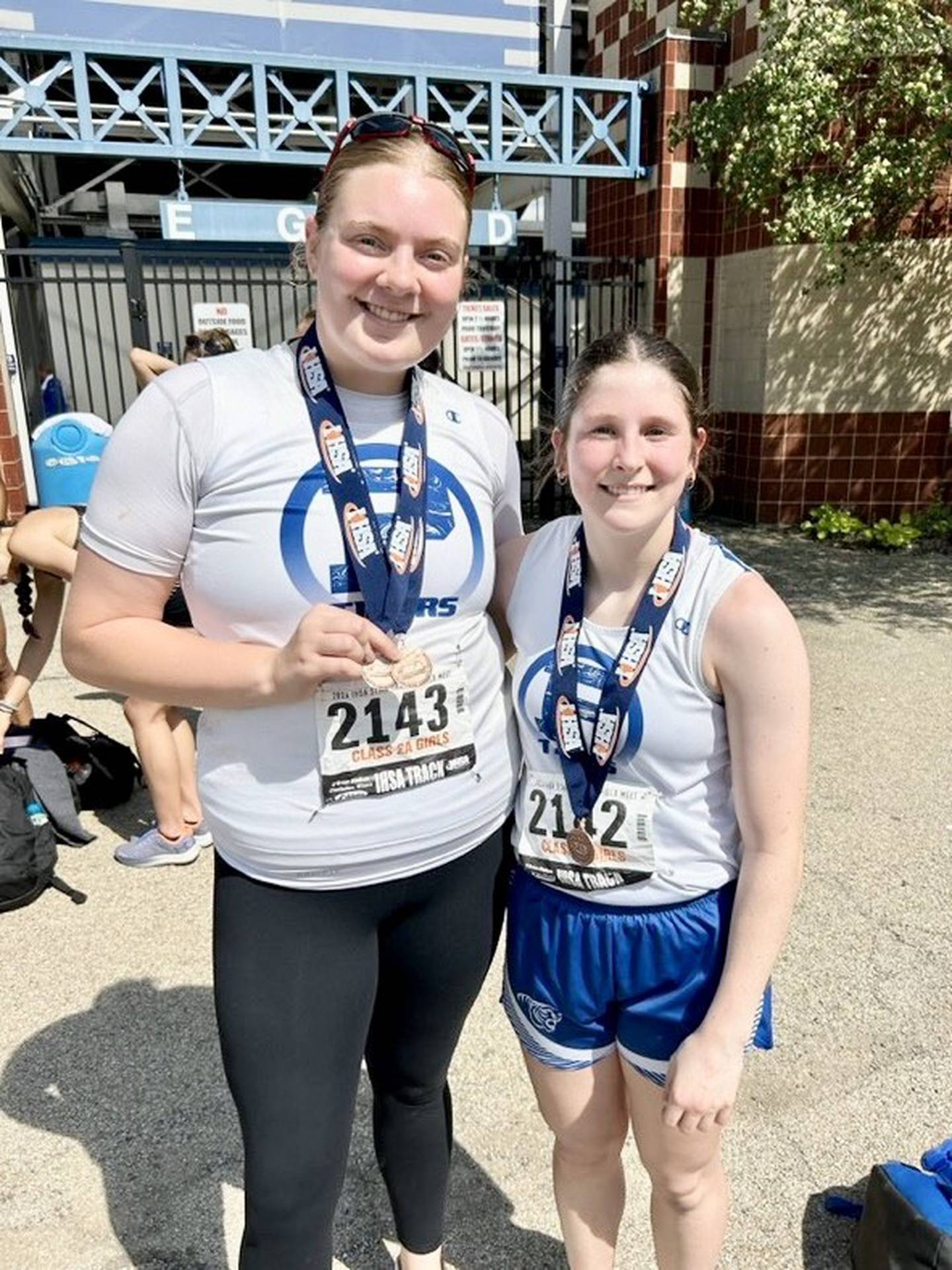 Princeton's Morgan Foes (left) and Camryn Driscoll, aka "Thunder and Lightning," brought home three state medals in Class 2A. Foes was fourth in the shot put and fifth in the discus while Driscoll placed ninth in the 400 meters.