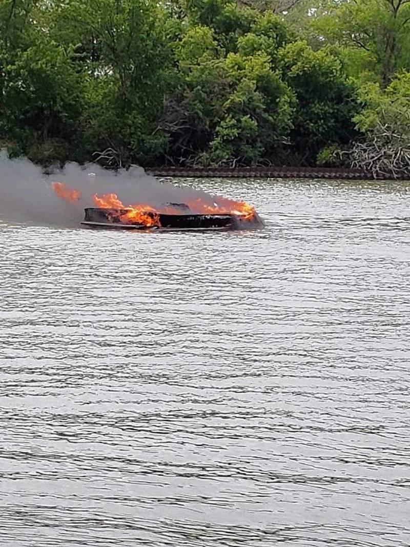 A small boat was fully involved in flames on Pistakee Lake the afternoon of Sunday, Aug. 6, 2023.