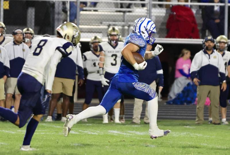 Princeton's Casey Etheridge is off to the races for an 85-yard touchdown Friday night at Bryant Field.