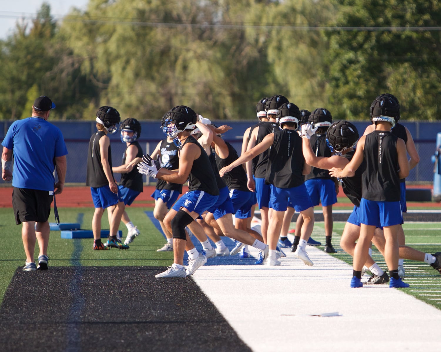 St. Charles North runs drills during the first day of practice on Monday Aug.12,2024 in St. Charles.