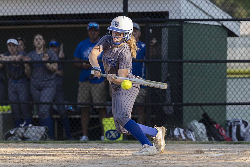Princeton’s Kelsea Klingenberg swats the ball to third to drive in the winning run against Rock Falls Wednesday, May 15, 2024 a the Class 2A regional softball semifinal.