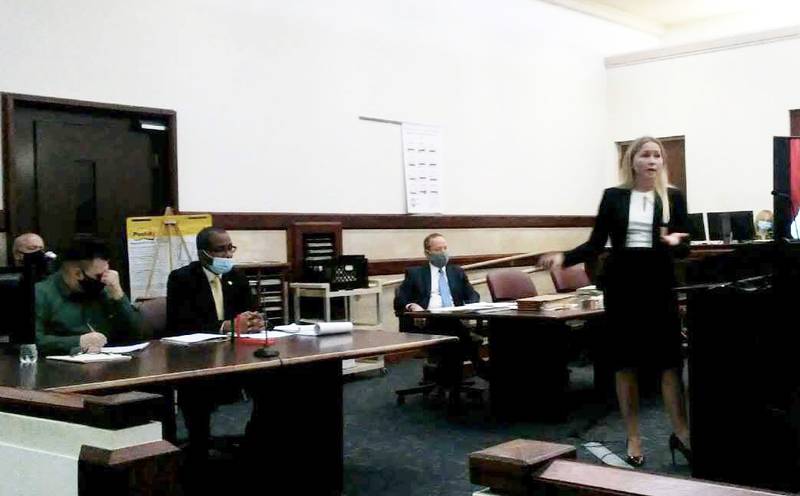 Kendall County Assistant State's Attorney Meghan Jirasek motions toward defendant James Davidson, left, during close arguments Feb. 16, 2022 at the Kendall County Courthouse in Yorkville. (Mark Foster - mfoster@shawmedia.com)