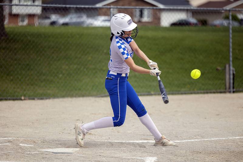 Newman’s Madison Duhon drives the ball over the fence to lead off the game against Monmouth-Roseville Friday, May 5, 2023.