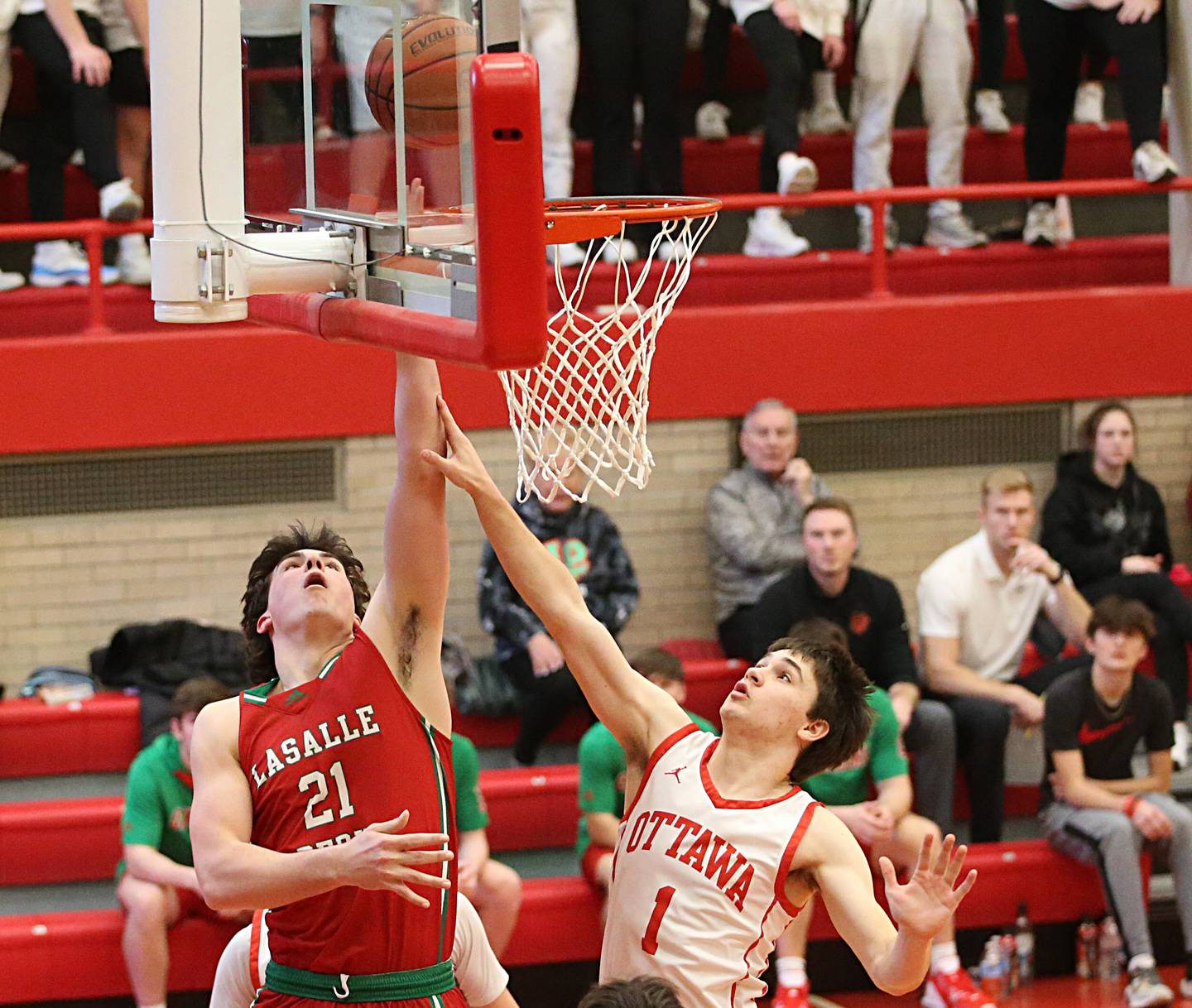 L-P's Josh Seneca shoots a shot as he is fouled by Ottawa's Conner Price in Kingman Gymnasium on Friday, Feb. 10, 2023 at Ottawa High School.