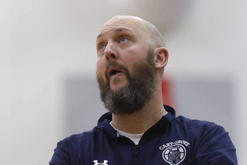 Cary-Grove Head Coach Tony Moretti looks at the score board as Cary-Grove tries to mound a comeback against Hampshire during a Fox Valley Conference girls basketball game Friday, Jan. 26, 2024, at Hampshire High School.