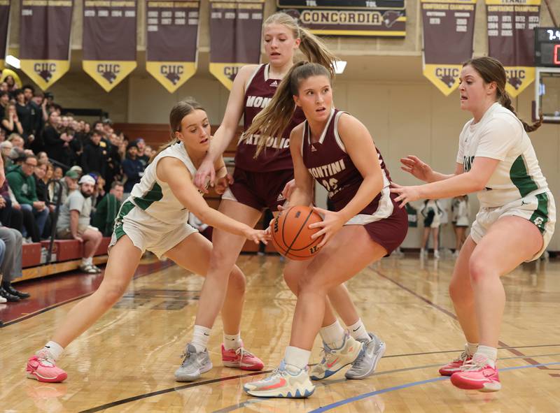 Montini Catholic’s Lily Spanos (20) looks to get to the basket the ball against Grayslake Central during the girls Class 3A Concordia University Supersectional basketball game on Monday, Feb. 26, 2024 in River Forest, IL.