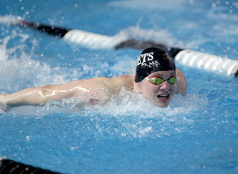 Marmion’s Sean Wehner competes in the consolation heat of the 100-yard butterfly during the IHSA Boys State Championships at FMC Natatorium in Westmont on Saturday, Feb. 25, 2023.