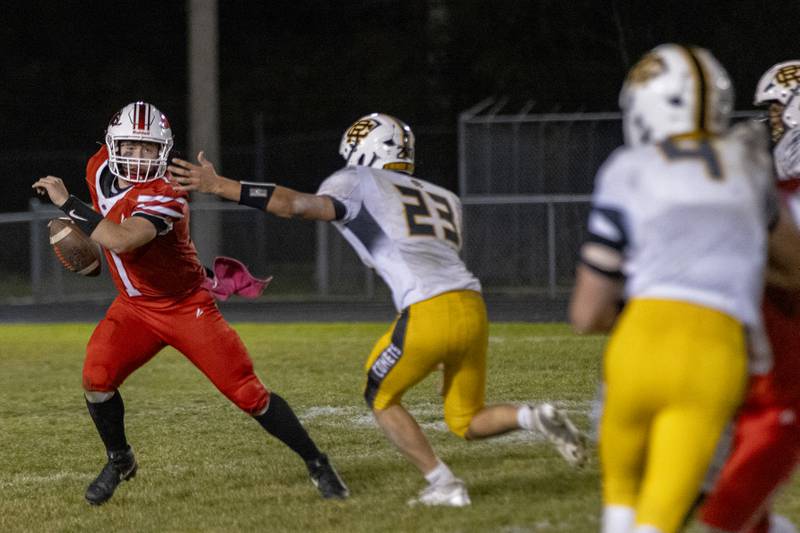 Streator's Isaiah Weibel attempts to escape the tackle of Reed-Custer's Hudson Cook during the game at Doug Dieken Field on October 18, 2024.