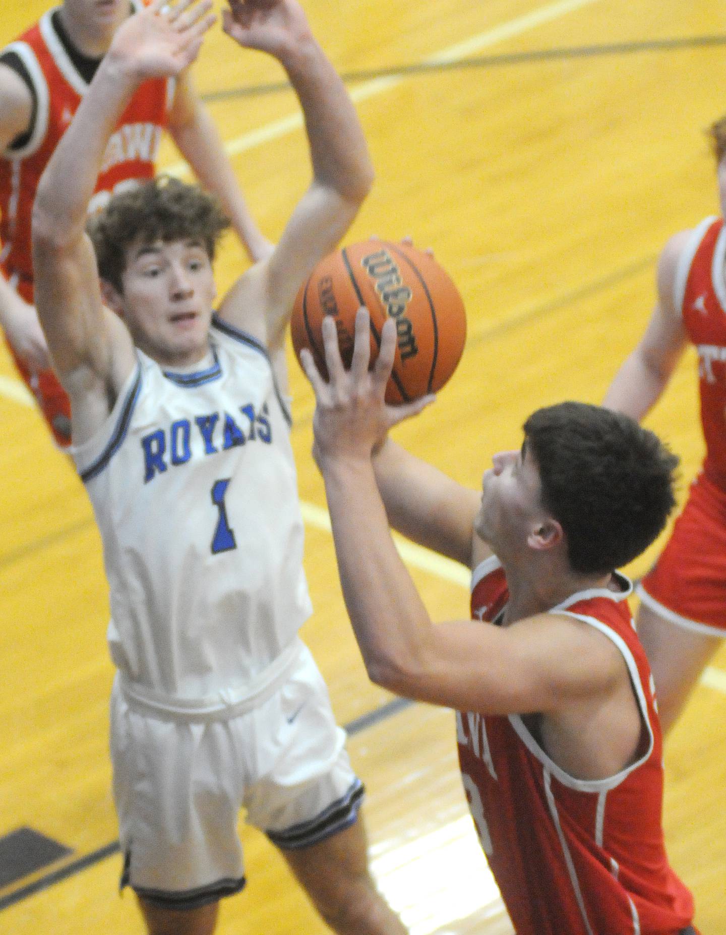 Ottawa's Cooper Knoll shoots past Hinckley-Big Rock's Tyler Smith in the Plano Christmas Classic on Wednesday, Dec. 27, 2023.