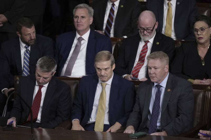 Rep. Jim Jordan, R-Ohio, seated center, listens as the votes are tallied, as the House votes for a new speaker, at the Capitol in Washington, Tuesday, Oct. 17, 2023. (AP Photo/J. Scott Applewhite)