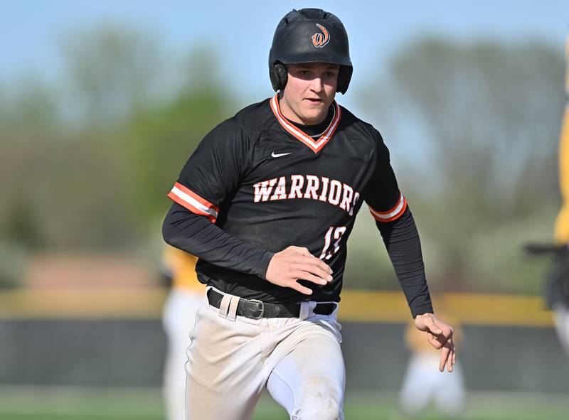 Lincoln-Way West's Tyler Bartley running to third base during the non-conference game against Joliet West on Friday, April. 19, 2024, at Joliet.