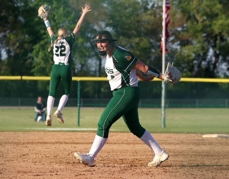 North Boone’s pitcher Camryn Carter and the Vikings celebrate a win in IHSA Softball Class 2A Regional Championship action at Marengo Friday.