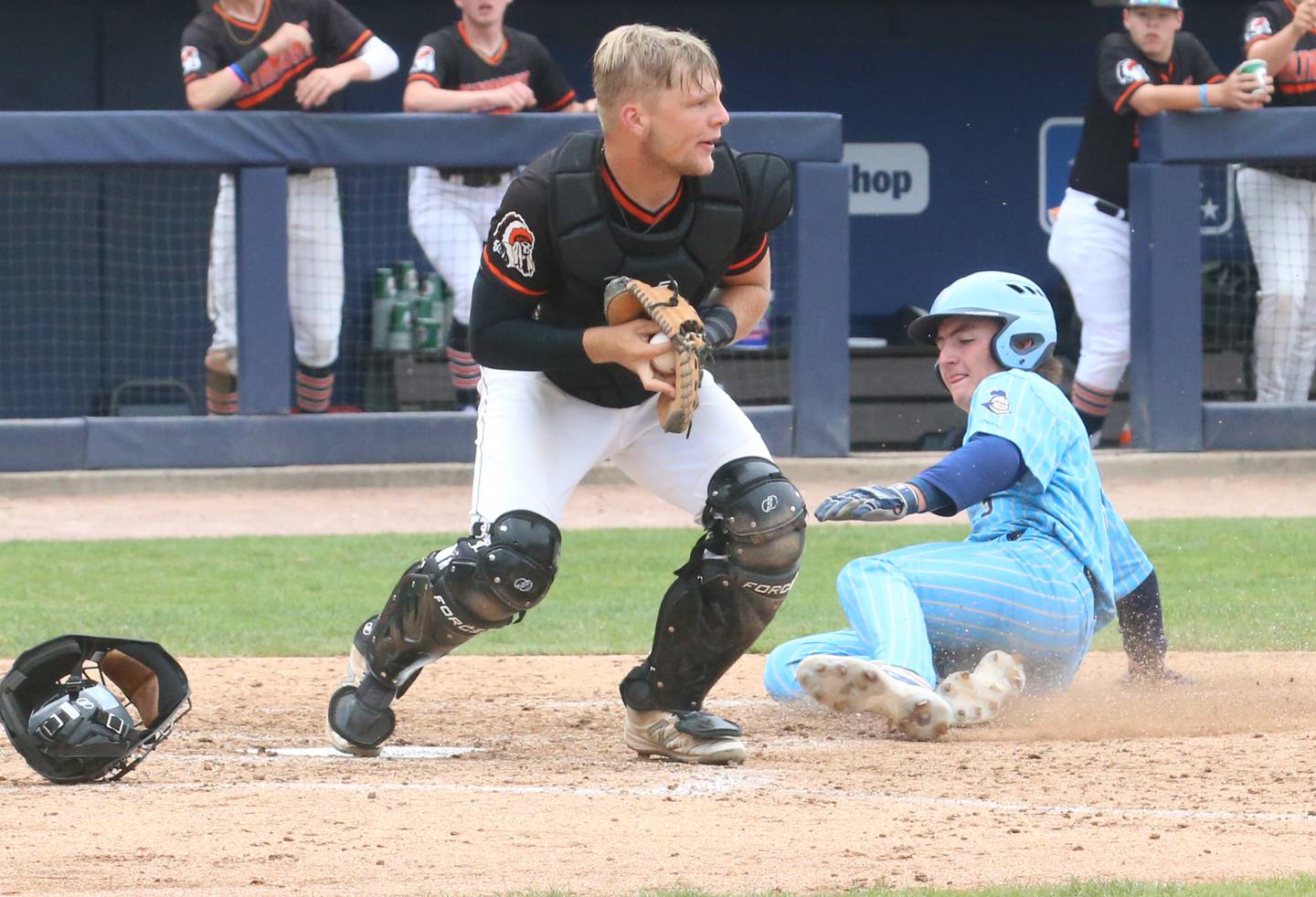 Altamont catcher Nathan Stuemke steps on home plate to force out Marquette's Carson Zellers during the Class 1A State championship game on Saturday, June 1, 2024 at Dozer Park in Peoria.