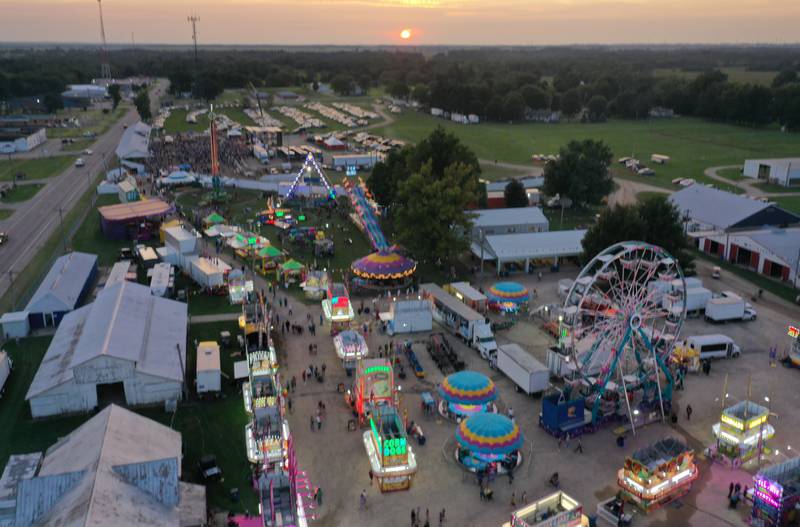 The sun sets over the 169th Bureau County Fair on Thursday, Aug. 22, 2024 in Princeton.