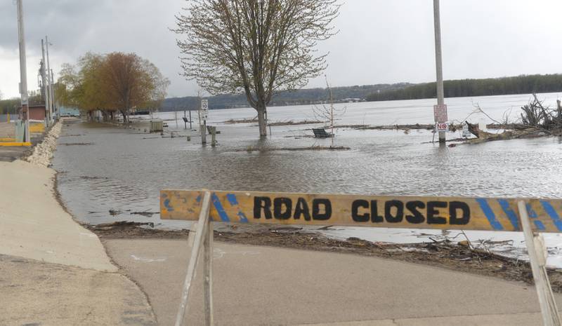 The Mississippi River flows into Marquette Park in Savanna on Saturday, April 2023. River levels were expected to continue to rise due to melting snow and rain north of Illinois. The river, currently at flood stage (16')  was projected to crest at 22'. The 2019 flood reached 21'.
