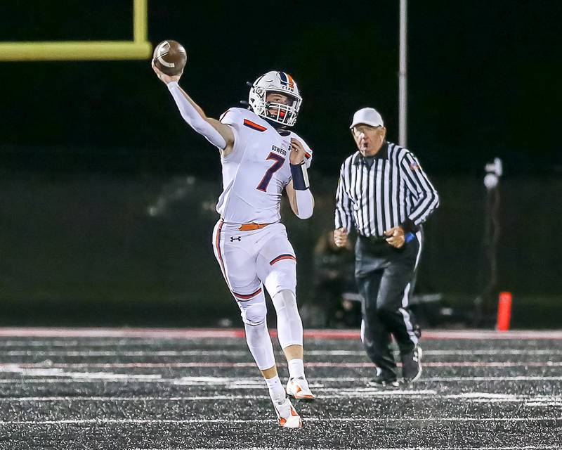 Oswego's Brett Connolly (7) throws down field during a football game between Oswego at Bolingbrook on Friday, Oct 4th, 2024  in Bolingbrook.