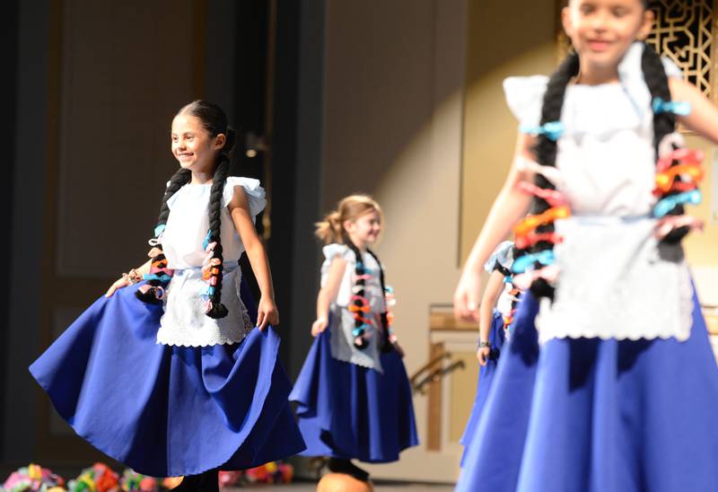 Congress Park Elementary School students including Kamila Murillo perform in the School District 102 Expo de Bellas Artes at Park Junior High in La Grange Friday, April 19, 2024.