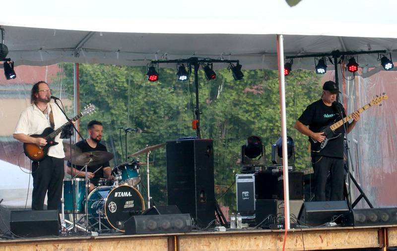 The Travis Reid Band plays music during the BBQ and Blues festival on Friday, Sept. 13, 2024 downtown La Salle.