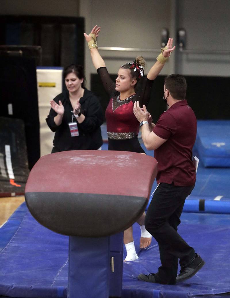 Prairie Ridge's Paige Male competes on the vault during the IHSA Girls Gymnastics State Final meet Friday February 18, 2022 at Palatine High School.