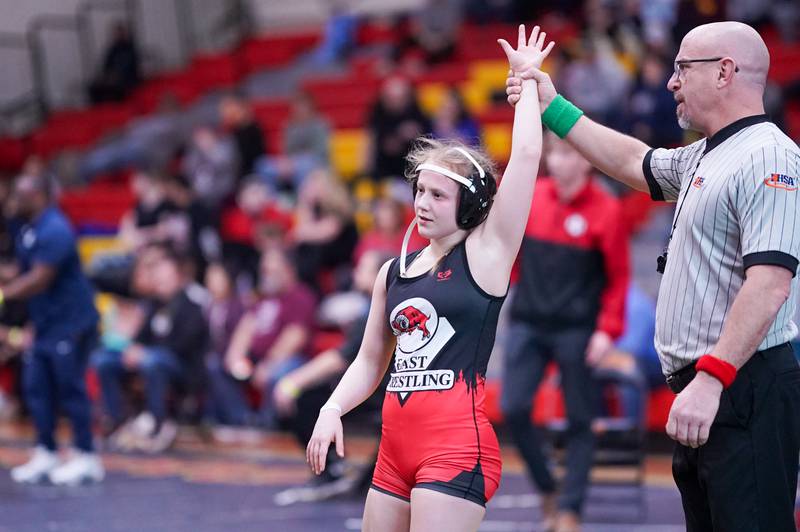 Glenbard East’s Nadiia Shymkiv wins her 105 pound championship match against Huntley’s Janiah Slaughter (not pictured) in the Schaumburg Girls Wrestling Sectional at Schaumburg High School on Saturday, Feb 10, 2024.