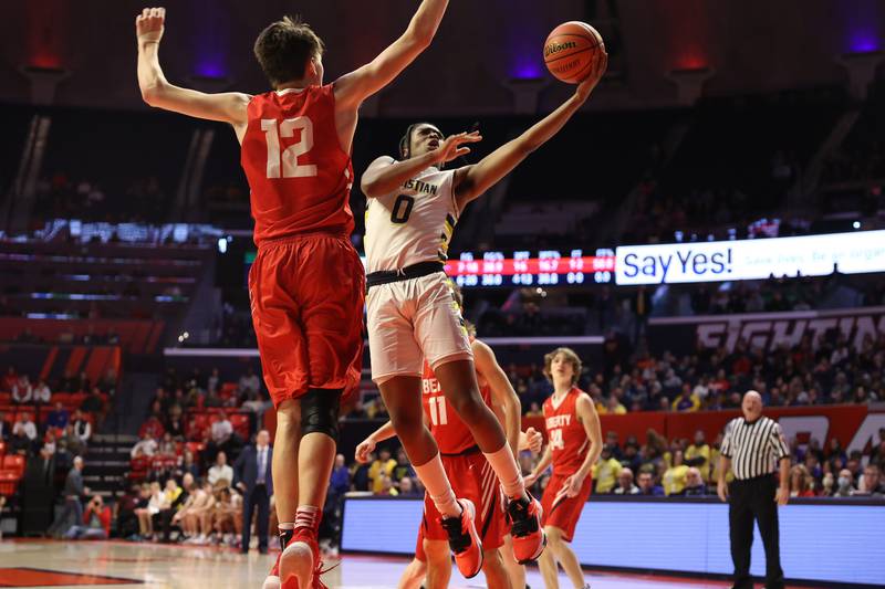 Yorkville Christian’s K.J. Vasser lays in a shot against Liberty in the Class 1A championship game at State Farm Center in Champaign. Friday, Mar. 11, 2022, in Champaign.
