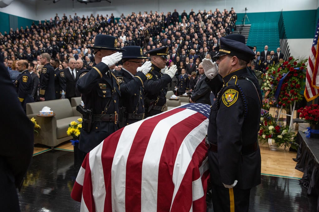 A funeral service for McHenry County Sheriff's Deputy Jacob Keltner is held at Woodstock North High School on Wednesday, March 13, 2019.