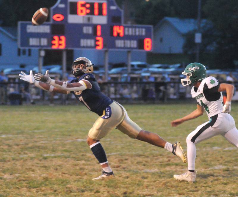 Marquette's Blayden Cassel reaches for an Anthony Couch pass as Seneca's Kevin Einhaus defends at Gould Stadium on Friday, Sept. 13, 2024.