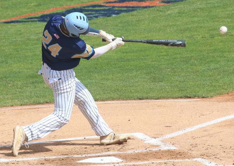 Marquette's Anthony Couch smacks a hit against Routt during the Class 1A semifinal game on Friday, May 31, 2024 at Dozer Park in Peoria.