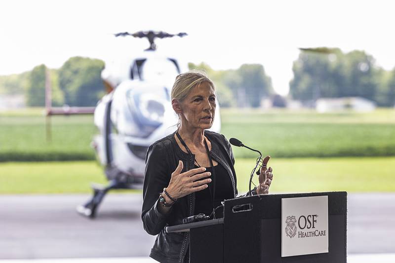 Kathy Devin, VP of OSF Aviation, tells a little about the history of the Life Flight program Wednesday, July 10, 2024 during an open house of the newest hangar at the Whiteside County Airport in Rock Falls.