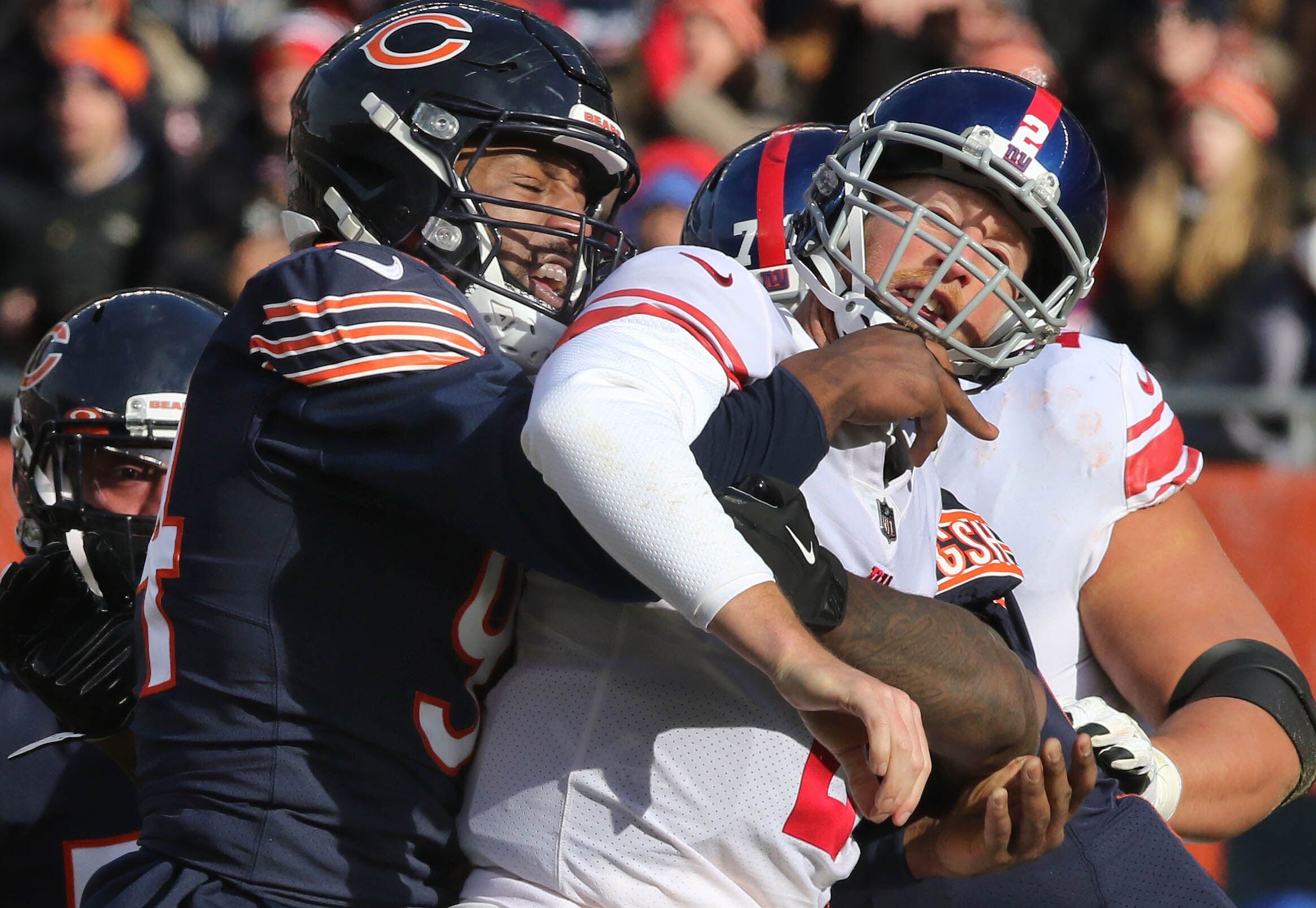 Leonard Peters of the Chicago Bears looks on the field before the