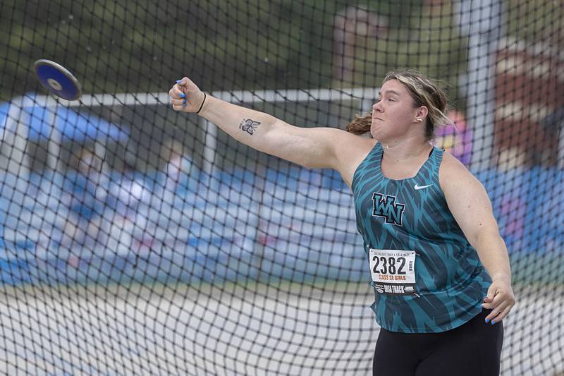 Woodstock North’s Ashley Janeczko throws the discus in the 2A event Saturday, May 18, 2024 at the IHSA girls state track meet in Charleston.