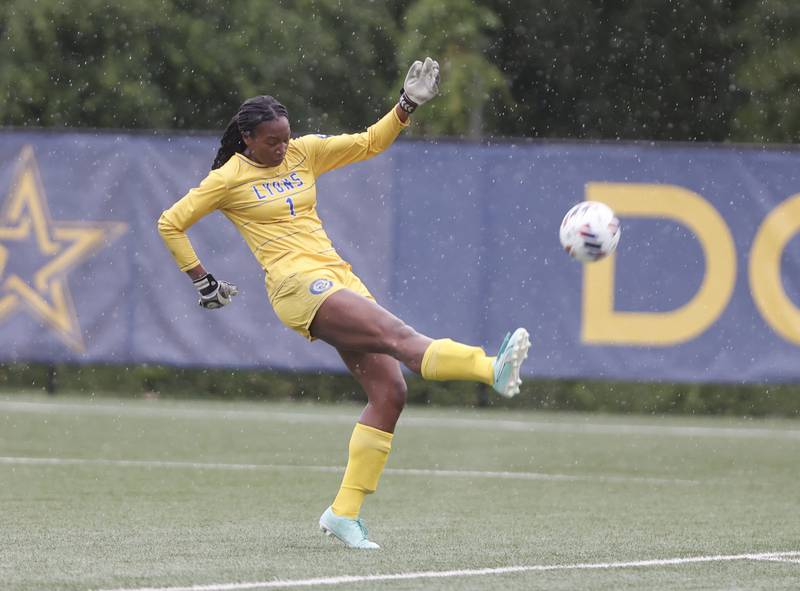 Lyons goalkeeper Nora Ezike puts the ball back into play during the Class 3A Dominican super-sectional between New Trier and Lyons Township in River Forest on Tuesday, May 28, 2024.