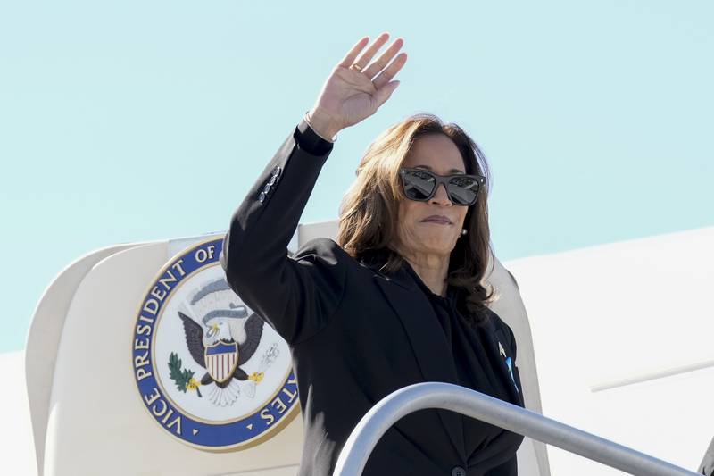 Democratic presidential nominee Vice President Kamala Harris boards Air Force Two at LaGuardia Airport in East Elmhurst, N.Y., Wednesday, Sept. 11, 2024. (AP Photo/Jacquelyn Martin)