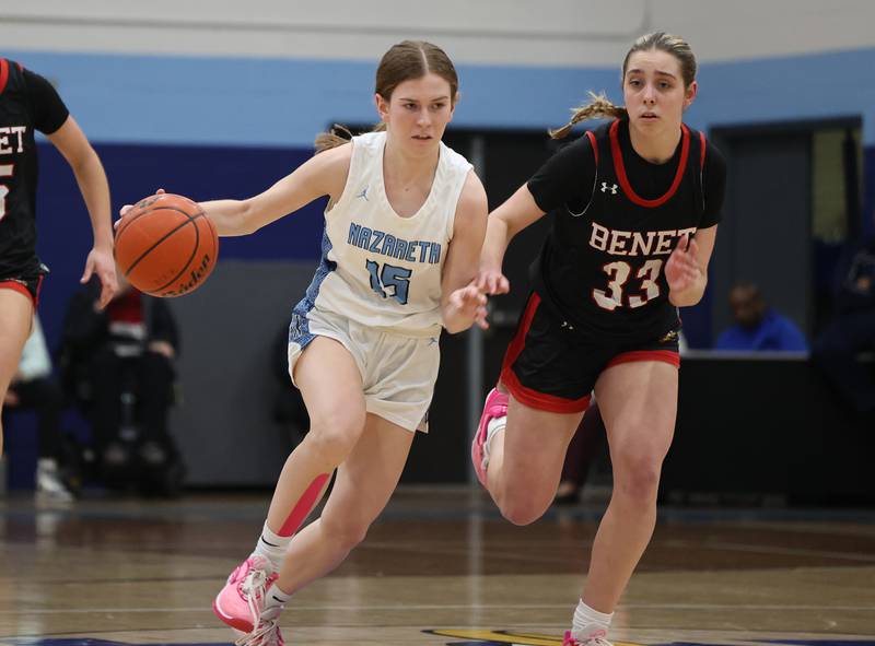 Nazareth’s Mary Bridget Wilson (15) handles the ball against Benet during a girls varsity basketball game on Monday, Jan. 29, 2024 in La Grange Park, IL.