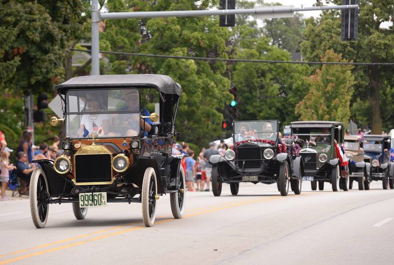 Antique ehicles make an appearance during the Downers Grove Fourth of July Parade on Thursday, July 4, 2024.