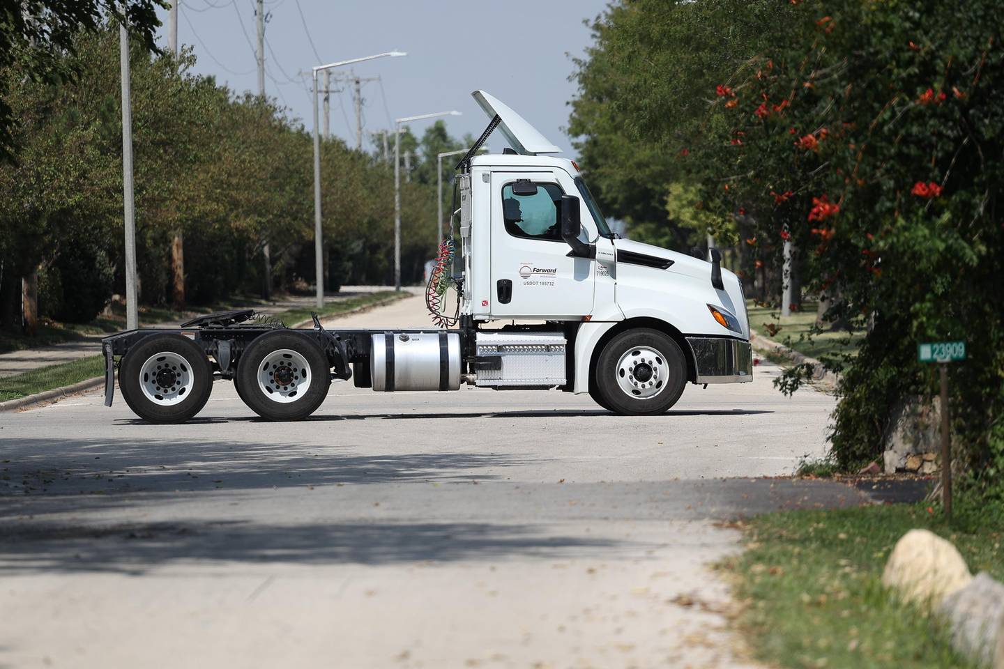 A semi drives down Millsdale Drive on Thursday, Sept. 5, 2024 in Elwood.