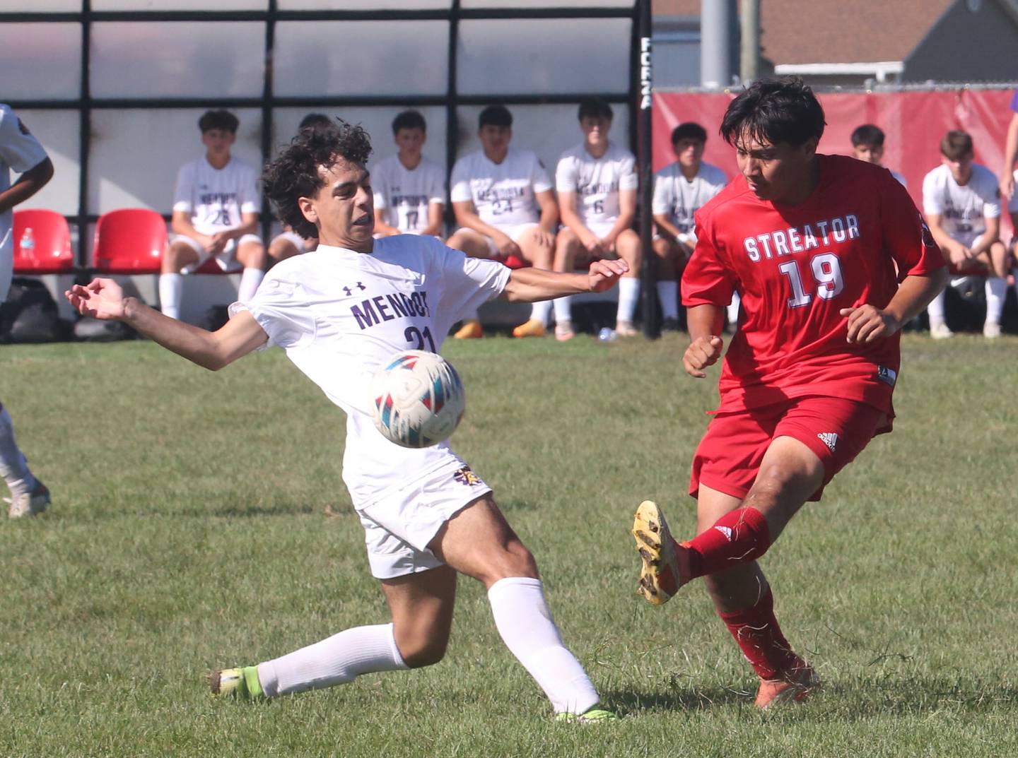 Streator's Jordy Sanchez kicks the ball away from Mendota's Sam Matura on Saturday, Aug. 31, 2024 at James Street Recreation Area in Streator.