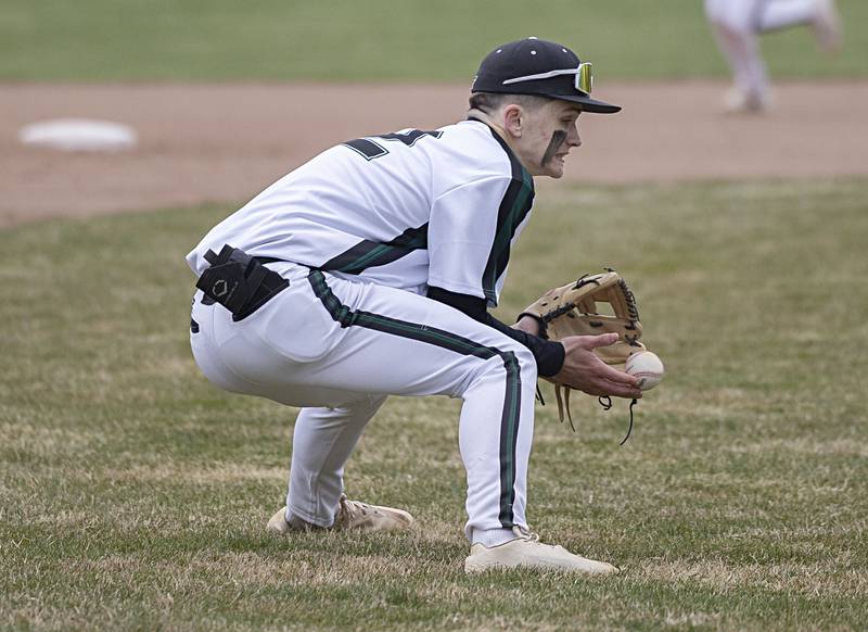 Rock Falls’ Ethan Moeller fields a ball at third base against Sterling Friday, March 29, 2024 at Rock Falls High School.