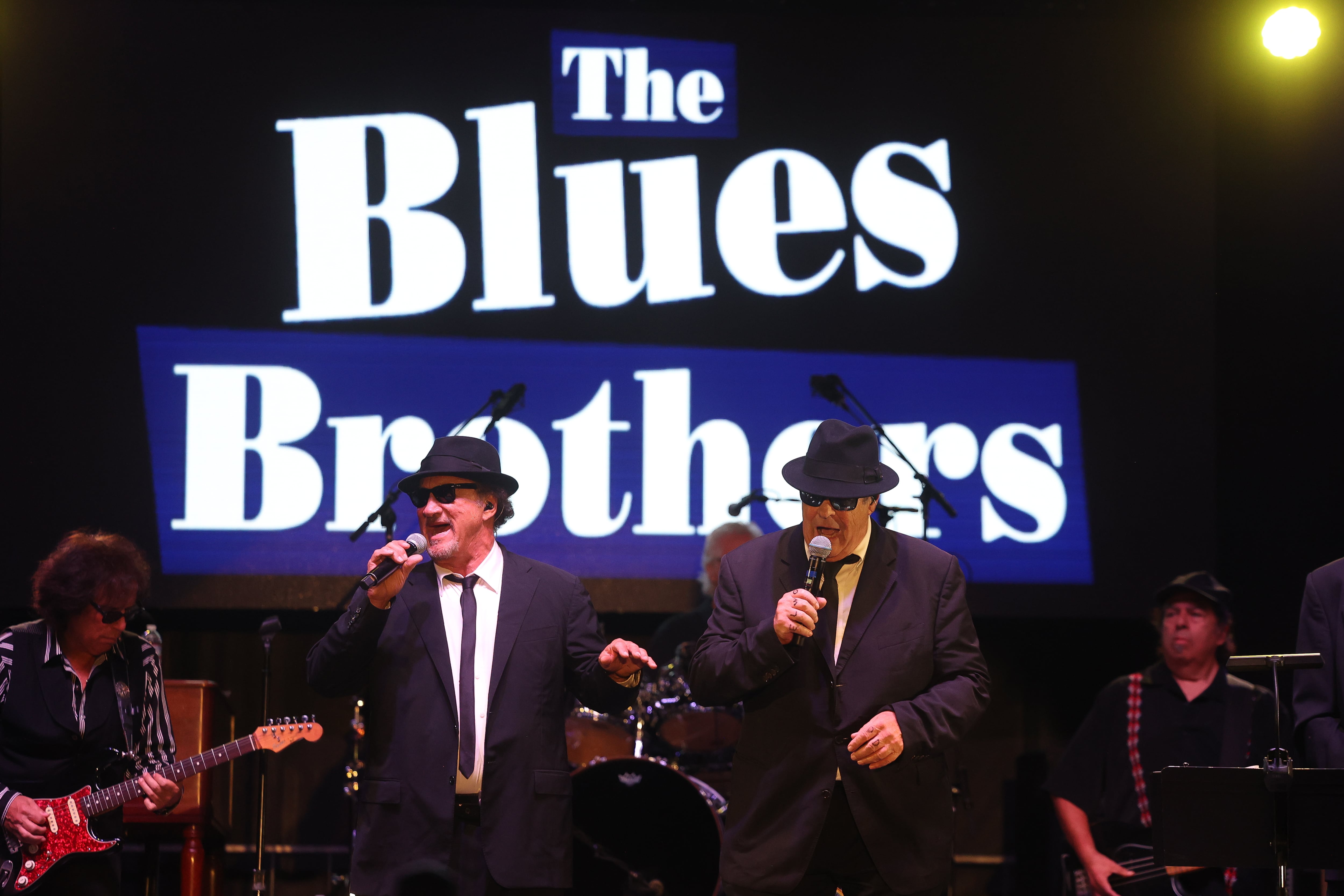 Jim Belushi. aka Zee Blues, and Dan Aykroyd, aka Elwood Blues, performs at Blues Brothers Con: The Sequel on Saturday, August 17, 2024 at the Old Joliet Prison.