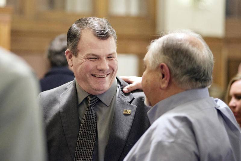 2018 Dixon Citizen of the Year Mark Dallas speaks with 1984 Citizen of the Year Bob Shomaker Friday night.