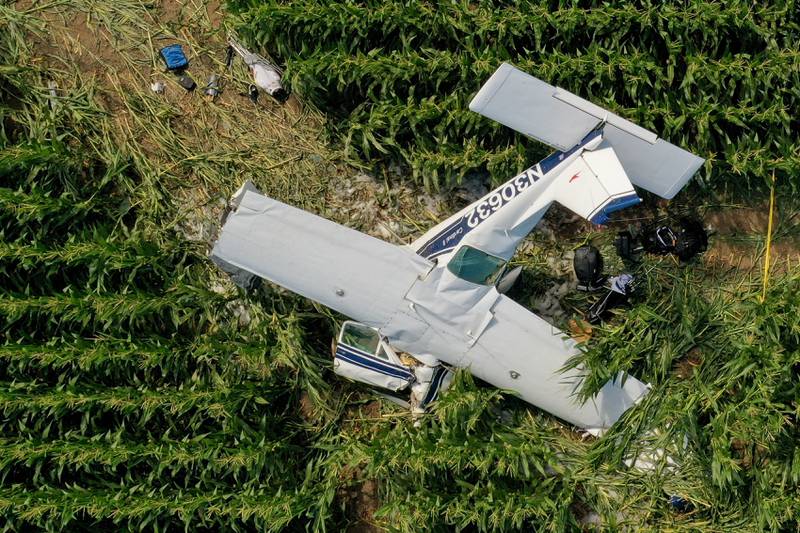 A plane rests in a corn field after crashing near the DeKalb Taylor Municipal Airport in Cortland on Thursday, July 27, 2023.