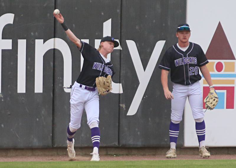 Wilmington's Jake Castle throws the ball back in to the infield with the help from teammate Reid Juster during the Class 2A State semifinal game on Friday, May 31, 2024 at Dozer Park in Peoria.