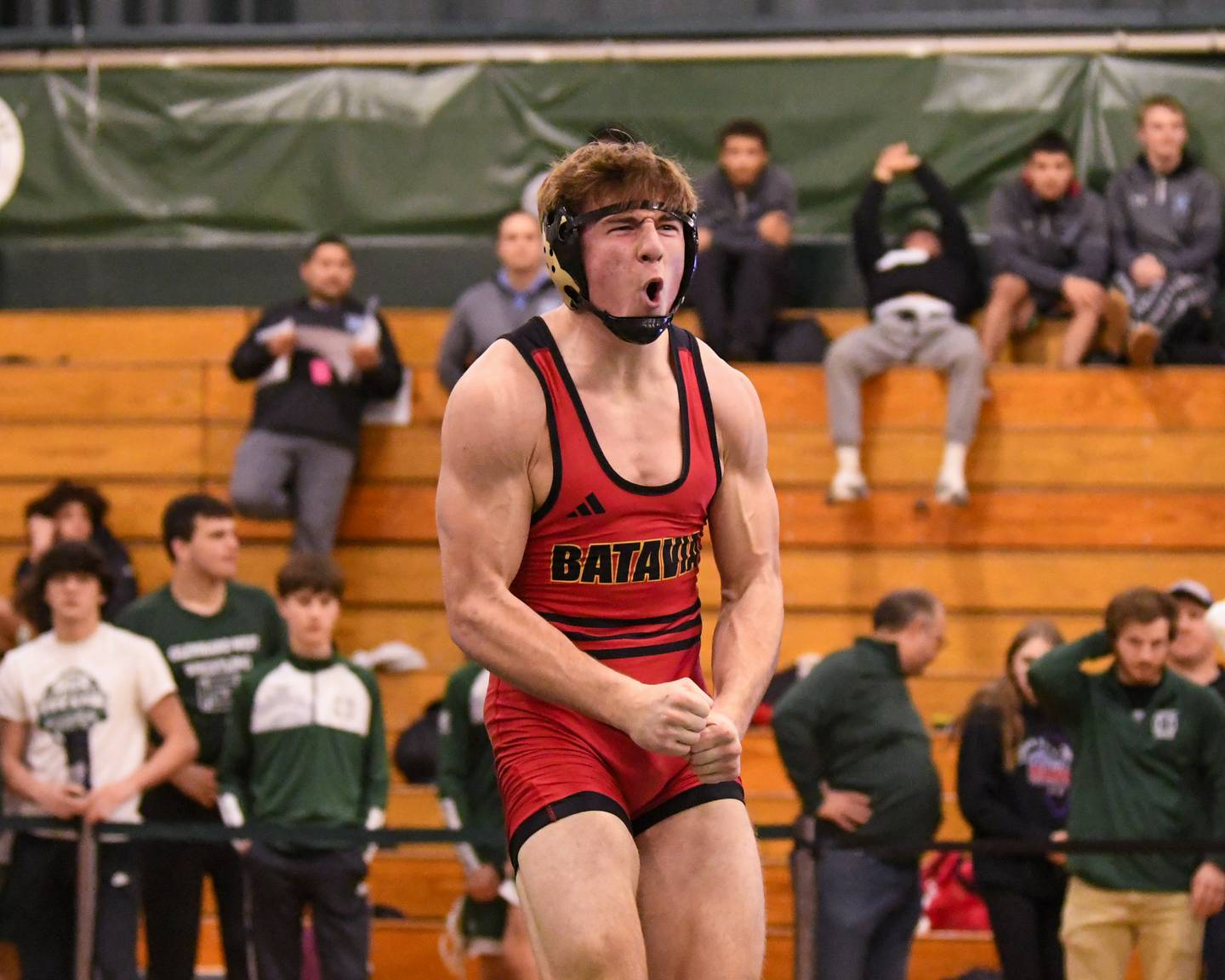 Batavia wrestler Ben Brown, celebrates after winning the 190 weight class regional title match over Glenbard West Sasha Boulton on Saturday Feb. 3, 2024, held at Glenbard West High School.