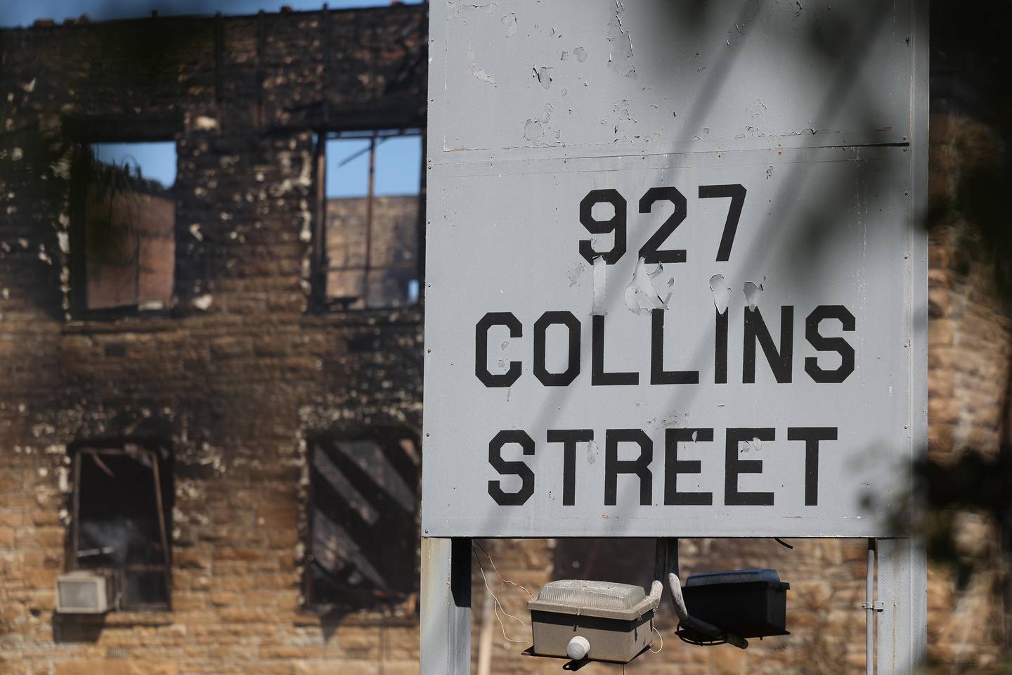 Only the brick walls remain standing at the historic U.S. Steel office building after a fire on Saturday, Sept. 7, 2024 in Joliet. The historic building along Collins Street was engulfed in flames early Saturday.