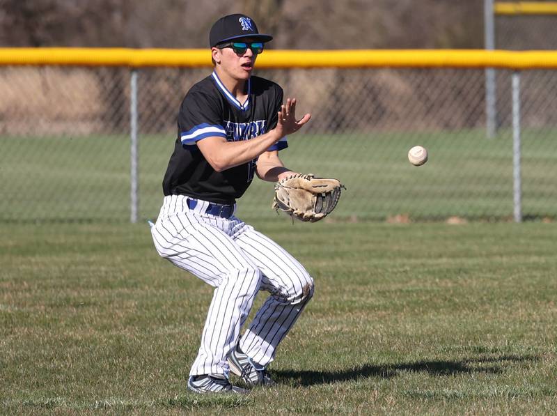 Newark's Blake Adams fields the ball on a bounce in left field Monday, April 8, 2024, during their game at Hinckley-Big Rock High School.