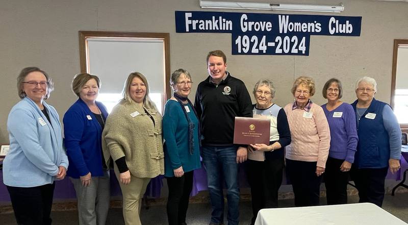 State representative Brad Fritts (center) attended the Jan.28 open house marking the 100th anniversary of the Franklin Grove Women's Club.