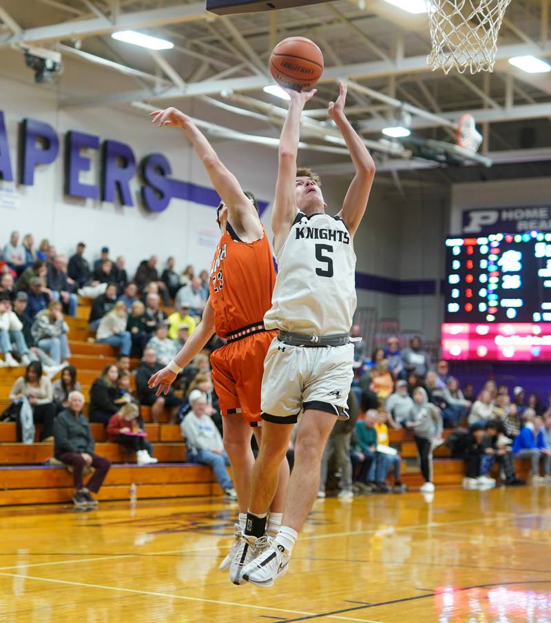 Photos Kaneland vs. Sandwich boys basketball in the 60th Plano