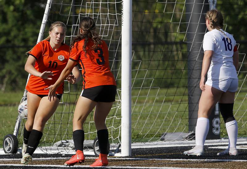 Crystal Lake Central's Brooklynn Carlson celebrates with Crystal Lake Central's Addison Schaffer after Carlson scored the first goal of the IHSA Class 2A Grayslake North Regional championship soccer match against Wauconda on Friday, May 17, 2024, at Grayslake North High School.